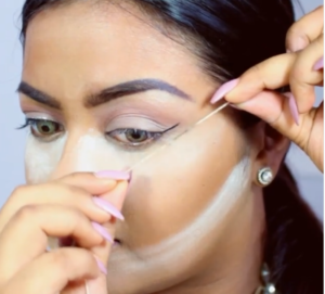 Beautyhacks : trait eyeliner avec une ficelle